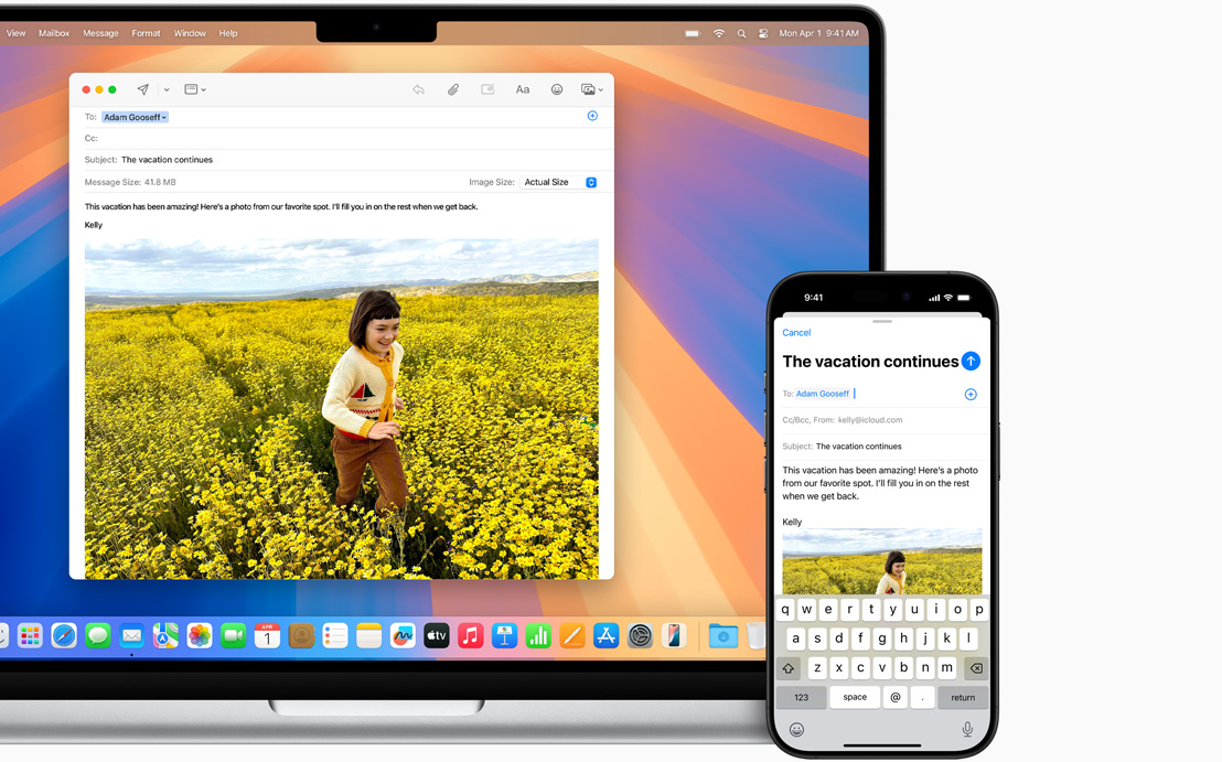 iPhone อยู่ข้างแล็ปท็อป Mac ที่กางเปิดอยู่ เพื่อสาธิตความสามารถในการเริ่มเขียนอีเมลบนอุปกรณ์เครื่องหนึ่ง แล้วมาเขียนต่อบนอีกเครื่องหนึ่ง