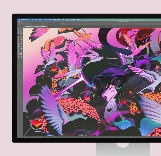 La pantalla de un monitor muestra una imagen colorida abierta en Adobe Photoshop