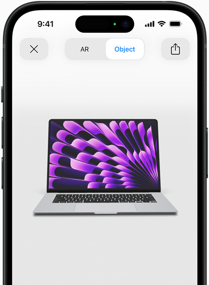 Preview of MacBook Air in Space Gray color being viewed in AR experience on iPhone
